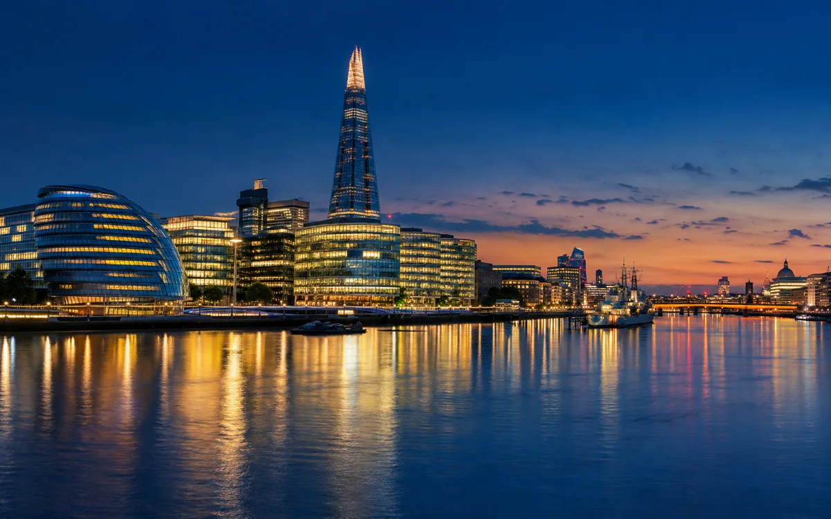 Illustrative London city architecture beside the river